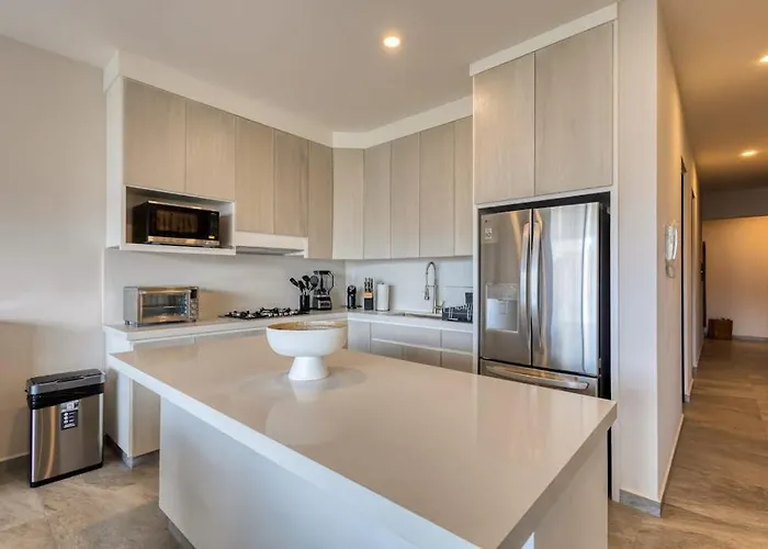 Peaceful Coastal With Pool, Balcony & Fitness Center Ferienhaus *